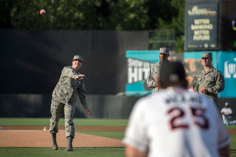 Chief Master Sgt. Beth Topa, 11th Wing command chief, throws out the first pitch for a Bowie Baysox game in Bowie, Md., July 15, 2016. The ceremonial throwing of the first pitch was part of the sixth Joint Base Andrews Military Appreciation Night that the Baysox holds to recognize JBA members for their dedication and military support. (U.S. Air Force photo by Airman 1st Class Philip Bryant)