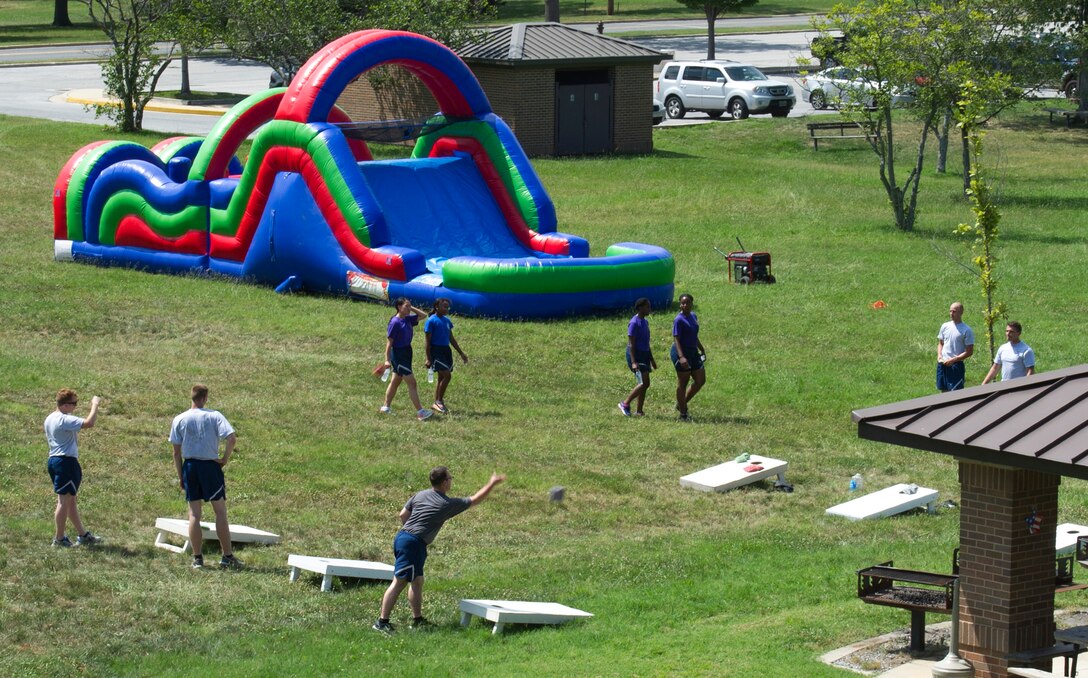 Members of Joint Base Andrews come together to support and participate in activities during the annual dorm challenge held on JBA, Md., July 15, 2016. Approximately 100 people attended the event, hosted by the installation’s Airmen Committed to Excellence club and supported by the USO. (U.S. Air Force photo by Airman Gabrielle Spalding)