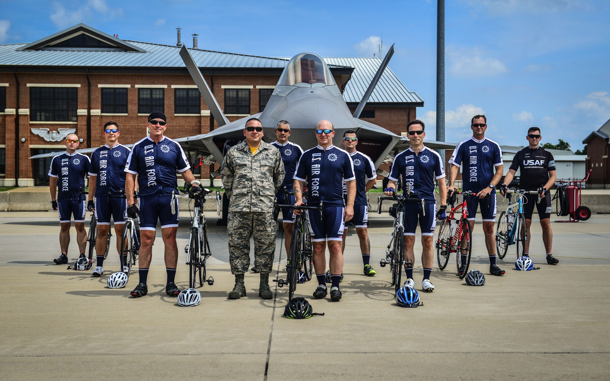 Members of the Air Force Cycling Team pose for a photo in front of the F-22
Raptor at Langley Air Force Base, Va., July 8, 2016. The team will travel to
Greenwood, Iowa to ride in the 43rd Register's Annual Great Bicycle Ride
Across Iowa, July 21-28. To prepare for the 500-mile ride, the
National Capital Region of the AFCT rode approximately 25 to 35 miles three
to four times each week. (U.S. Air Force photo by Tech. Sgt. Daylena Ricks)
