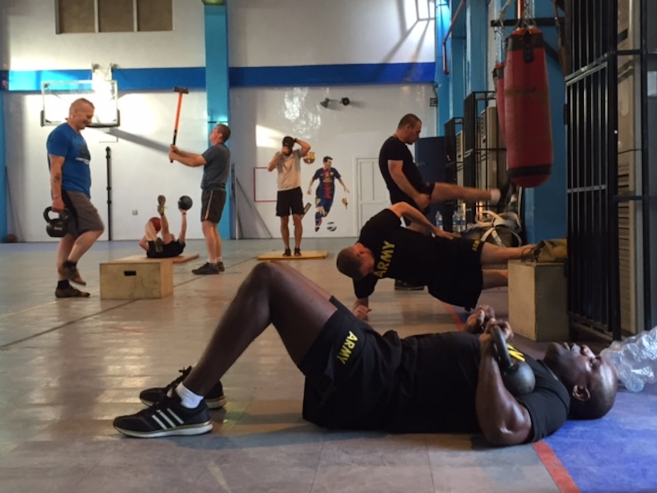 Army Command Sgt. Maj. John Wayne Troxell, the senior enlisted advisor to the chairman of the Joint Chiefs of Staff, leads an intense, early morning workout session at Resolute Support headquarters in Kabul, Afghanistan, July 17, 2016. DoD photo by Lisa Ferdinando