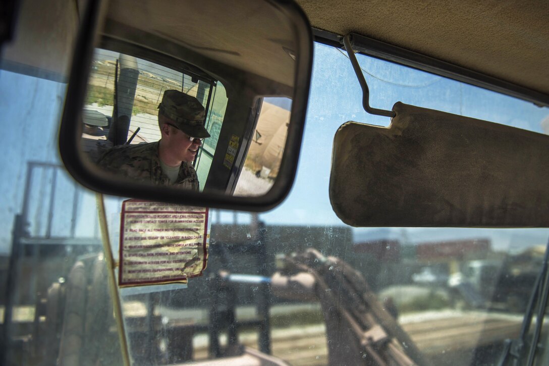Air Force Airman 1st Class Hayden Kidder operates a forklift to move mail at Bagram Airfield, Afghanistan, July 13, 2016. Kidder is a knowledge management journeyman assigned to the 455th Expeditionary Communications Squadron. Air Force photo by Senior Airman Justyn M. Freeman