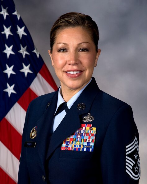 Chief Master Sergeant Sarah A. Sparks, 436th Airlift Wing command chief, poses for an official photo March 25, 2016, at Dover Air Force Base, Del. (U.S. Air Force Photo/Roland Balik)