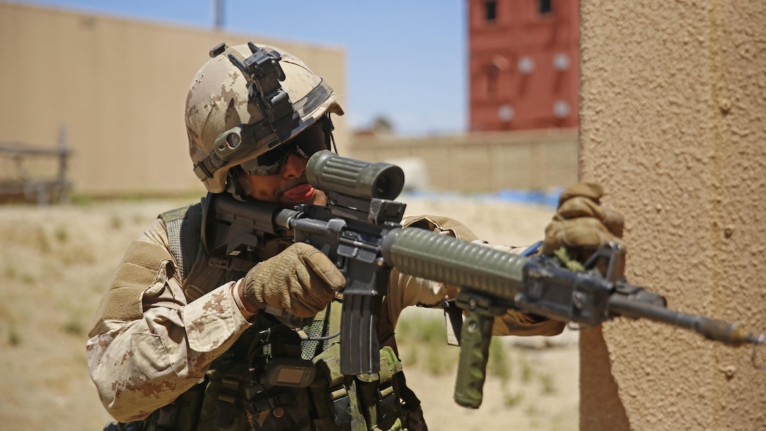 A U.S. Marine with 3rd Battalion, 5th Regiment, posts security during military operations on urban terrain training as part of the Rim of the Pacific Exercise in Marine Corps Base Camp Pendleton, California, July 19, 2016. The training was conducted with U.S., Chilean, and Canadian service members to enhance interoperability between partner nations. The world's largest international maritime exercise, RIMPAC provides a unique training opportunity that helps participants foster and sustain the cooperative relationships that are critical to ensuring the safety of sea lanes and security on the world's oceans.