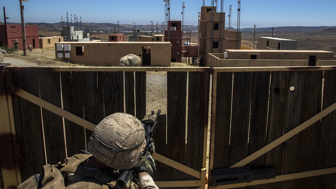 U.S. Marine Staff Sgt. Bryan Whitlatch provides cover for Mexican sailors as they participate in a mechanized assault during the Southern California portion of Rim of the Pacific Southern California portion of Rim of the Pacific 2016 at Marine Corps Base Camp Pendleton, California, July 18, 2016. The purpose for the mechanized assault is so partner nations can integrate and communicate with each other for future operations. Units participating in the exercise were Marines with India Company, 3rd Battalion, 5th Marine Regiment and 3rd Assault Amphibious Battalion, both with the 1st Marine Division, and service members with the Mexican navy. Twenty-six nations, more than 40 ships and submarines, more than 200 aircraft and 25,000 personnel are participating in RIMPAC from June 30 to Aug. 4, in and around the Hawaiian Islands and Southern California. The world's largest international maritime exercise, RIMPAC provides a unique training opportunity that helps participants foster and sustain the cooperative relationships that are critical to ensuring the safety of sea lanes and security on the world's oceans. RIMPAC 2016 is the 25th exercise in the series that began in 1971.