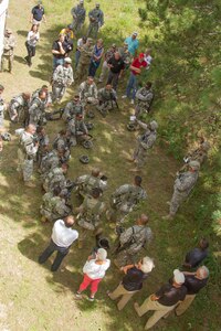 U.S. Army Reserves Ambassadors attend an after action review (AAR) following a simulated ambush during Warrior Exercise (WAREX) 86-16-03 at Fort McCoy, Wis., July 14, 2016. WAREX is designed to keep soldiers all across the United States ready to deploy. (U.S. Army photo by Spc. Cody Hein/Released)