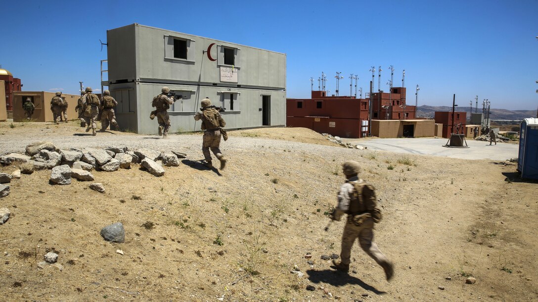 U.S. Marines move to a secure position while responding to simulated enemy fire during military operations on urban terrain training at Marine Corps Base Camp Pendleton, California, July 19, 2016. The training was conducted with U.S., Chilean, and Canadian service members to enhance interoperability between partner nations. Twenty-six nations, more than 40 ships and submarines, more than 200 aircraft and 25,000 personnel are participating in RIMPAC from June 30 to Aug. 4, in and around the Hawaiian Islands and Southern California. The world's largest international maritime exercise, RIMPAC provides a unique training opportunity that helps participants foster and sustain the cooperative relationships that are critical to ensuring the safety of sea lanes and security on the world's oceans. RIMPAC 2016 is the 25th exercise in the series that began in 1971.