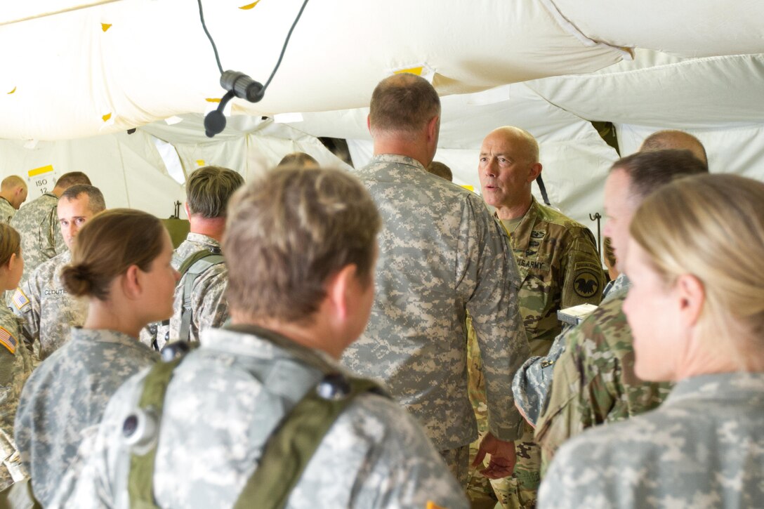 U.S. Army Soldiers from the 452nd Combat Support Hospital, Milwaukee, Wis., welcome Lieutenant General Charles Luckey, Commanding General of the U.S. Army Reserve Command, during Warrior Exercise (WAREX) 86-16-03 at Fort McCoy, Wis., July 19, 2016. WAREX is designed to keep soldiers all across the United States ready to deploy. (U.S. Army photo by Spc. Cody Hein/Released)