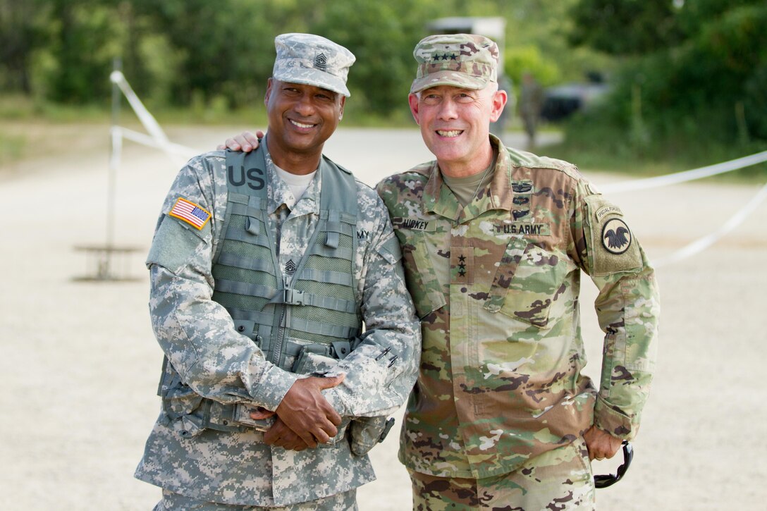 U.S. Army Command Sergeant Major Kenneth Mudd, Medical Readiness Training Command, poses with Lieutenant General Charles Luckey, Commanding General of the U.S. Army Reserve Command, during Warrior Exercise (WAREX) 86-16-03 at Fort McCoy, Wis., July 19, 2016. WAREX is designed to keep soldiers all across the United States ready to deploy. (U.S. Army photo by Spc. Cody Hein/Released)