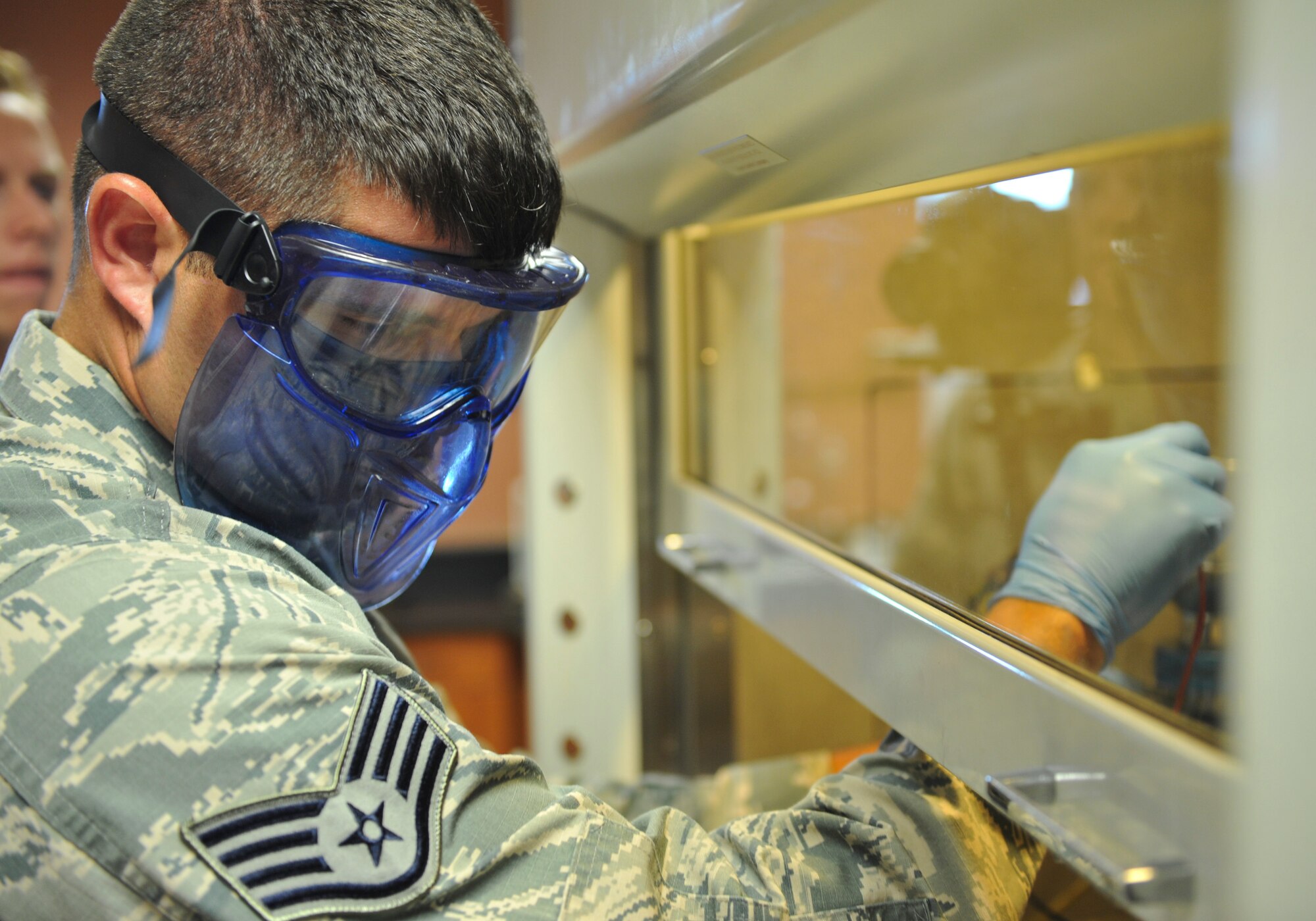 U.S. Air Force Staff Sgt. David Bryant, 325th Logistics Readiness Squadron fuels laboratory technician, performs a fuel sample check at the fuels laboratory at Tyndall Air Force Base, Fla., July 18, 2016. When fuel arrives at the base, it is tested to ensure it is clean, serviceable fuel. (U.S. Air Force photo by Senior Airman Dustin Mullen/Released) 