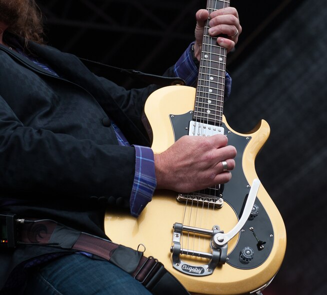James Young, guitarist for the Eli Young Band, plays during a concert July 16, 2016, at Ramstein Air Base, Germany. The band toured Ramstein after its Pizza Hut won the “Wing-A-Palooza” challenge after the Kaiserslautern Military Community served the most wings out of all overseas Pizza Huts on military installations. (U.S. Air force photo/Airman 1st Class Lane T. Plummer)