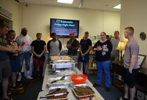 Natalie Luksan, Airman Ministry Center coordinator, gives announcements during a dinner at Ramstein Air Base, Germany, July 15, 2016. Club 7 holds dinners for Airmen E-4 and below every Friday. (U.S. Air Force photo/ Airman 1st Class Joshua Magbanua)