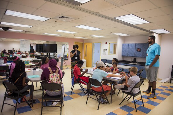 Angela Cottman, a 628th Air Base Wing master resilience trainer and BOUNCE instructor, talks to participants of the first resiliency teen camp, named BOUNCE, July 14, 2016, at the Joint Base Charleston, S.C., youth center. BOUNCE, which stands for Be optimistic, Observe thoughts, Use strengths, Never give up, Communicate effectively and Embrace you, was a weeklong camp designed to teach teens the necessary skills to overcome daily stressors associated to military families. (U.S. Air Force photo/Staff Sgt. Jared Trimarchi)