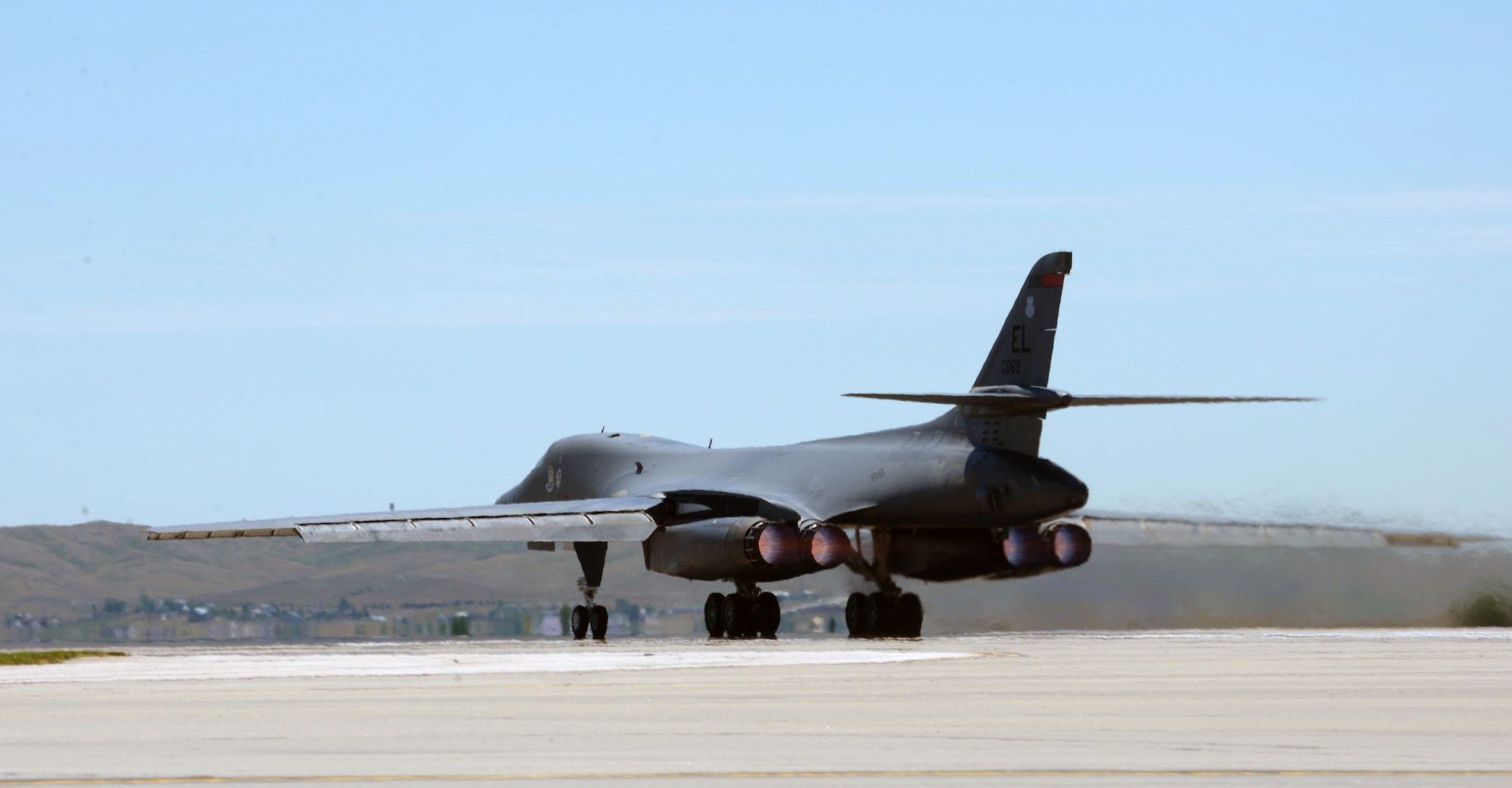 A B-1 bomber takes off as a part of an incentive flight at Ellsworth Air Force Base, S.D., July 15, 2016. Chief Master Sgt. Sonia Lee, the command chief of the 28th Bomb Wing, in the incentive flight on the bomber to gain a better understanding of the mission, activities accomplished to generate a training sorte. (U.S. Air Force photo by Airman Donald Knechtel) 