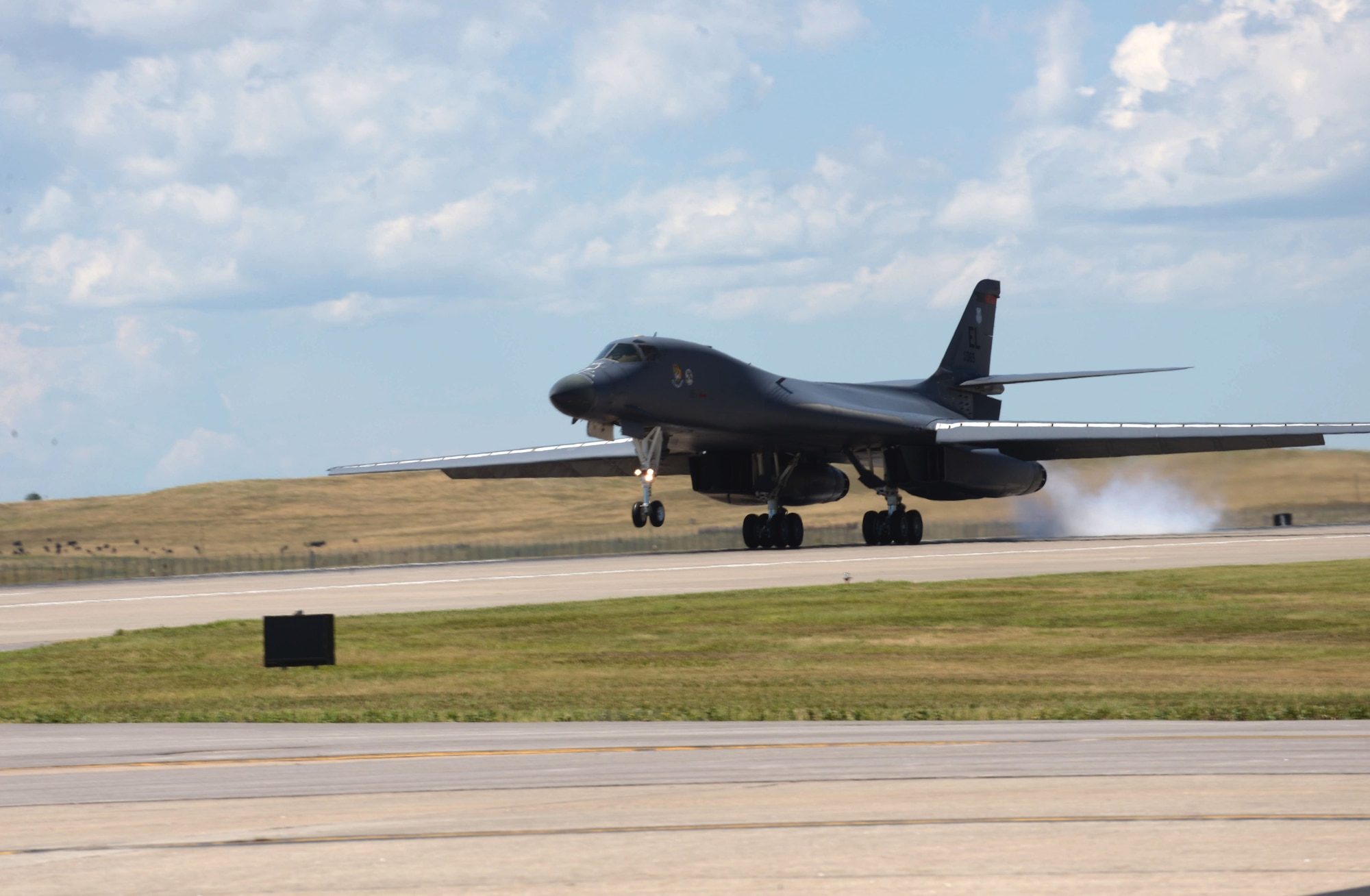 A B-1 bomber touches down at Ellsworth Air Force Base, S.D., July 25, 2016, after concluding an incentive flight for Chief Master Sgt. Sonia Lee, the command chief of the 28th Bomb Wing. The flight was to familiarize Lee with all that goes into flying the B-1, who’s involved, and to experience its capabilities firsthand. (U.S. Air Force photo by Airman Donald Knechtel) 