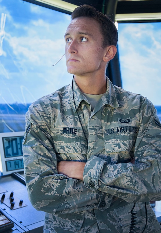Airman 1st Class Collin White, a 305th Operations Support Squadron air traffic controller, monitors a radar screen in the control tower on Joint Base McGuire-Dix-Lakehurst, N.J., July 14, 2015. White recently won the 2016 JB MDL Service Member of the Year Competition in the junior enlisted category, and was selected for the Air Force Marathon Team. (U.S. Air Force photo/Senior Airman Lauren Pitts)