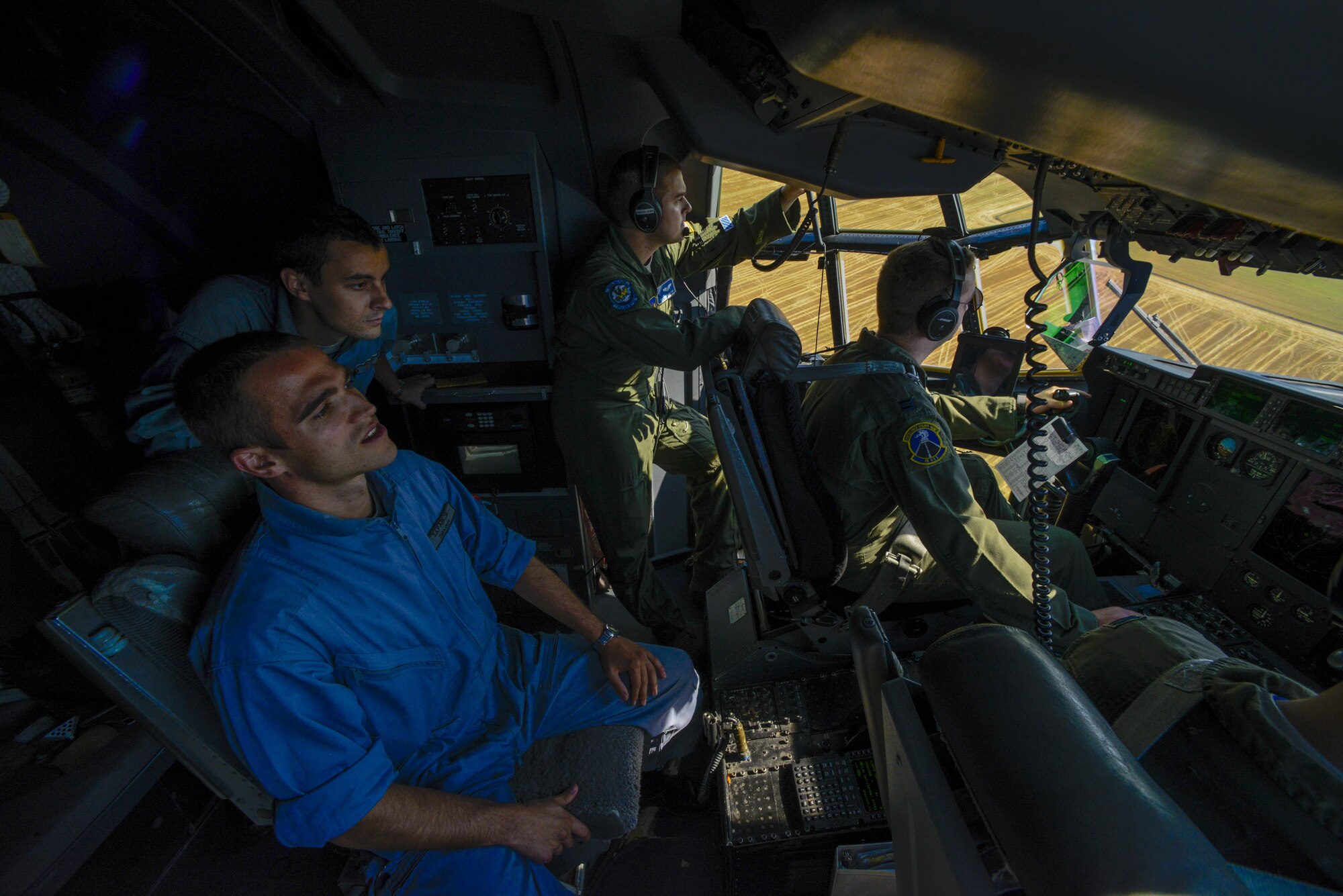 U.S. and Bulgarian Airmen participate in a formation flight in a U.S. Air Force C-130J Super Hercules and C-27J Spartan over Plovdiv, Bulgaria during exercise Thracian Summer 2016, July 20, 2016. Through Exercise Thracian Summer, the United States and Bulgaria will enhance their mutual abilities to work together, with other NATO nations and with key regional partners on regional security, and help prepare Bulgaria for potential future operations in support of contingency operations around the world. The U.S. values the shared commitment and close cooperation with Bulgaria and other NATO allies on countering a range of regional and global threats. (U.S. Air Force photo/Senior Airman Nicole Keim) 