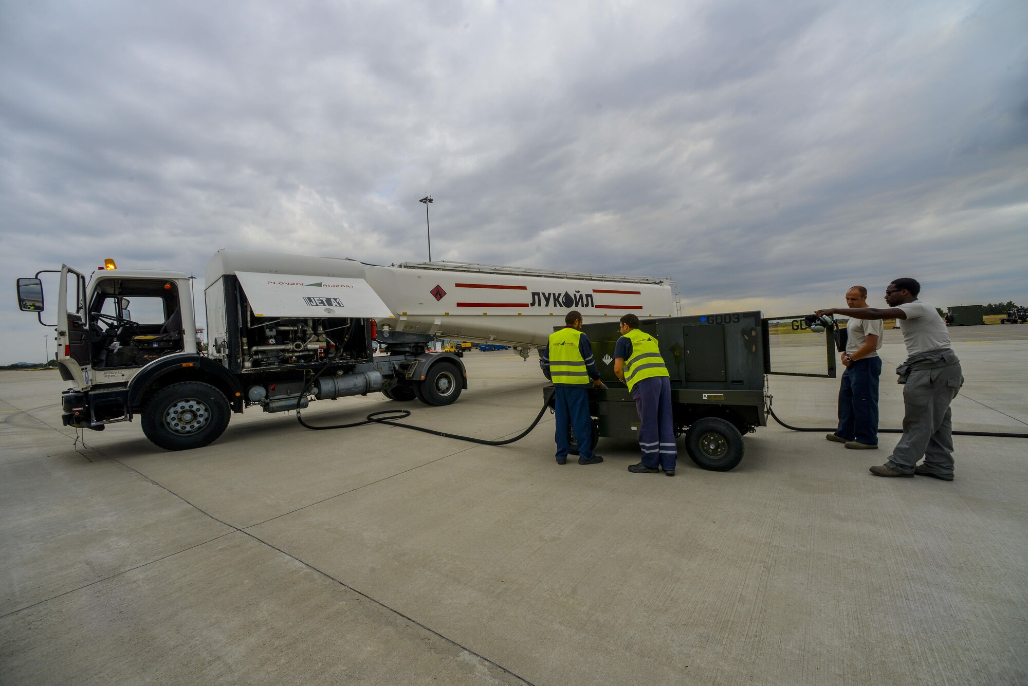 U.S. Airmen and Bulgarian fuel technicians refuel a C-130J Super Hercules at Plovdiv Airport, Bulgaria July 20, 2016. Through Exercise Thracian Summer 2016, the United States and Bulgaria will enhance their mutual abilities to work together, with other NATO nations and with key regional partners on regional security, and help prepare Bulgaria for potential future operations in support of contingency operations around the world. The U.S. values the shared commitment and close cooperation with Bulgaria and other NATO allies on countering a range of regional and global threats. (U.S. Air Force photo/Senior Airman Nicole Keim)