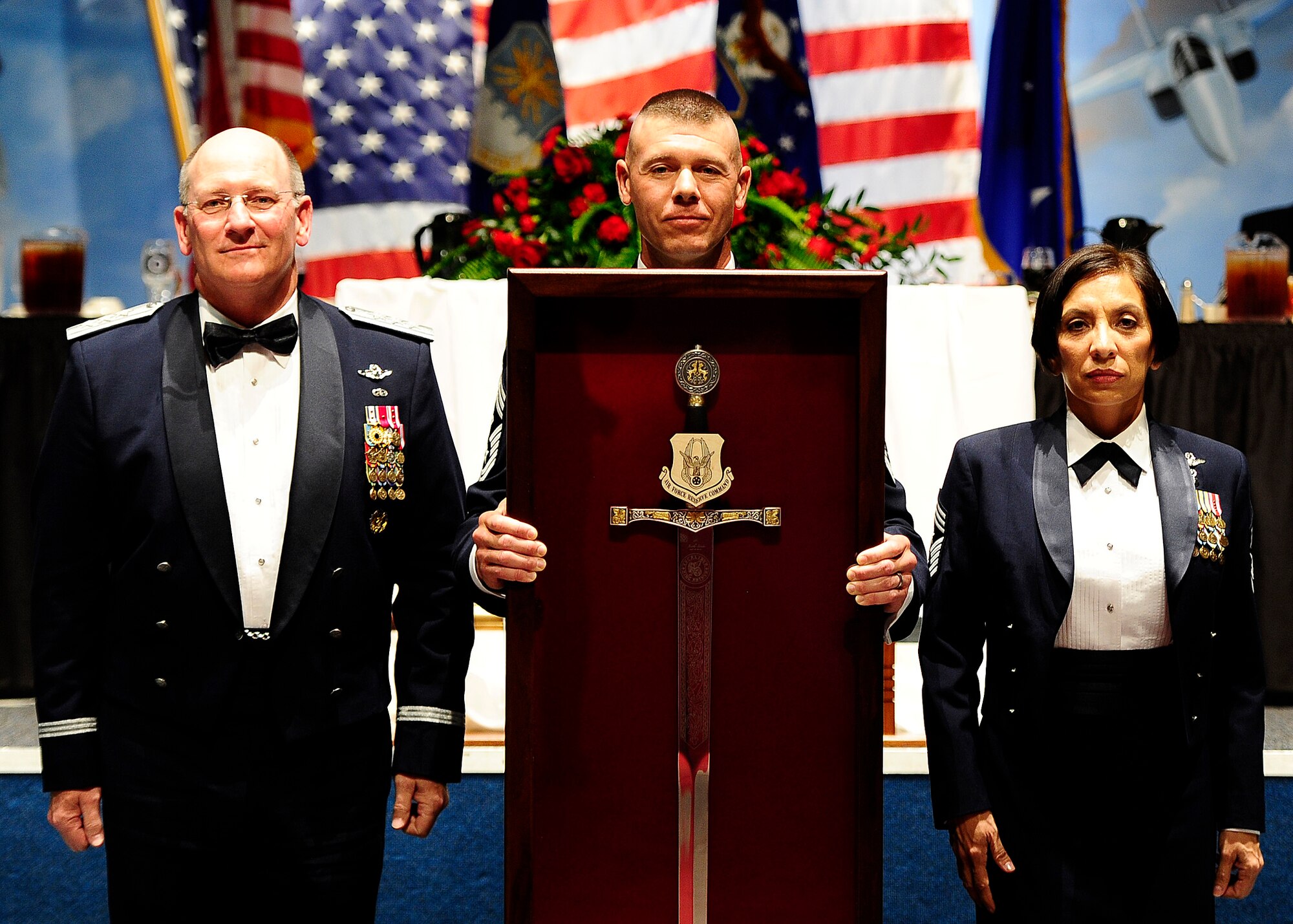 ergeant at Arms Chief Master Sgt. Paul Tomlinson and CMSgt of the Mess Erica Kelly present the sword to former chief of Air Force Reserve Command, Lt. Gen. James F. Jackson, during the Order of the Sword ceremony at the Museum of Aviation in Warner Robins, Ga., July 13, 2016. The Order of the Sword is an honor awarded by the NCOs of a command to recognize individuals they hold in high esteem and for their contributions to the enlisted corps. (U.S. Air Force photo by Tech. Sgt. Stephen D. Schester)