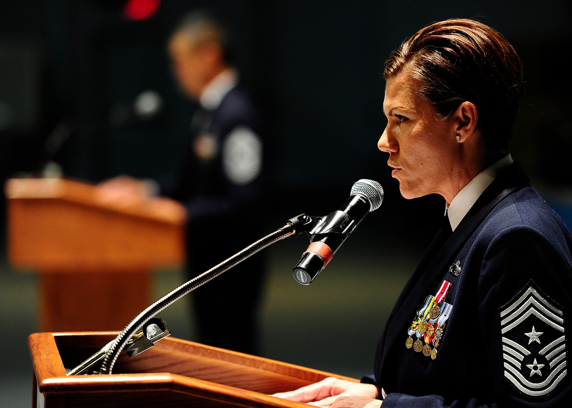 U.S. Air Force Chief Master Sgt. Ruthe Flores performs her duties as Duty Sergeant for the Order of the Sword ceremony at the Museum of Aviation in Warner Robins, Ga., July 13, 2016. The Order of the Sword is an honor awarded by the NCOs of a command to recognize individuals they hold in high esteem and for their contributions to the enlisted corps. (U.S. Air Force photo by Tech. Sgt. Stephen D. Schester)