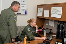 U.S. Air Force Reserve Maj. Chris Dickens, C-130J instructor pilot, and Capt. Kelly Welling, C-130J pilot, plan an off-station training flight at Little Rock Air Force Base, Ark., July 19, 2016. Both Airmen are assigned to the 327th Airlift Squadron, 913th Airlift Group at Little Rock. The 913 AG is a C-130J Super Hercules Air Force Reserve unit at Little Rock AFB, and is the only C-130 Classic Association unit in the Air Force. (U.S. Air Force photo by Master Sgt. Jeff Walston)  
