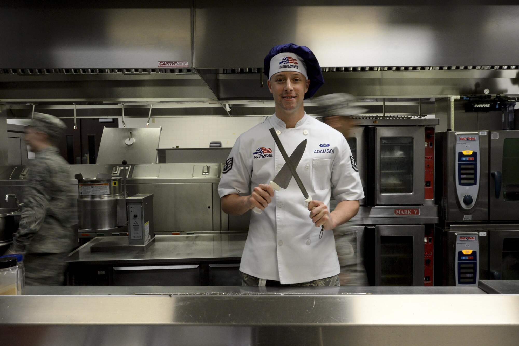 U.S. Air Force Staff Sgt. Michael Adamson is a swing-shift lead for the 19th Force Support Squadron at Little Rock Air Force Base, Ark. Adamson received the Hennessy Travel Award for his customer service and culinary skills after the Hennessy Travel Association evaluated the Hercules Dining Facility.  (U.S. Air Force photo by Senior Airman Mercedes Taylor) 