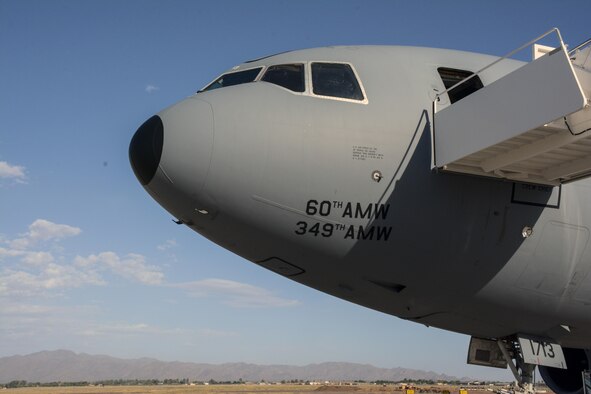 At mission complete, the crew poses for a photo outside the KC-10 Extender on the Travis Air Force Base flightline July 16, 2016. An aircrew of 70th Air Refueling Squadron members departed Travis Air Force Base, Calif. July 11, 2016 en route to Royal Air Force Base Fairford in Gloucestershire, England. The purpose of the trip is to refuel F-35A Lightning II jet fighters that are returning to the United States after participating in the world's largest air show. (U.S. Air Force photos by Staff Sgt. Madelyn Brown) 