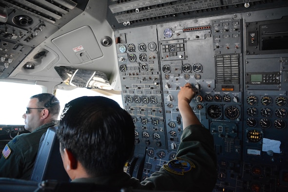 At mission complete, the crew poses for a photo outside the KC-10 Extender on the Travis Air Force Base flightline July 16, 2016. An aircrew of 70th Air Refueling Squadron members departed Travis Air Force Base, Calif. July 11, 2016 en route to Royal Air Force Base Fairford in Gloucestershire, England. The purpose of the trip is to refuel F-35A Lightning II jet fighters that are returning to the United States after participating in the world's largest air show. (U.S. Air Force photos by Staff Sgt. Madelyn Brown) 