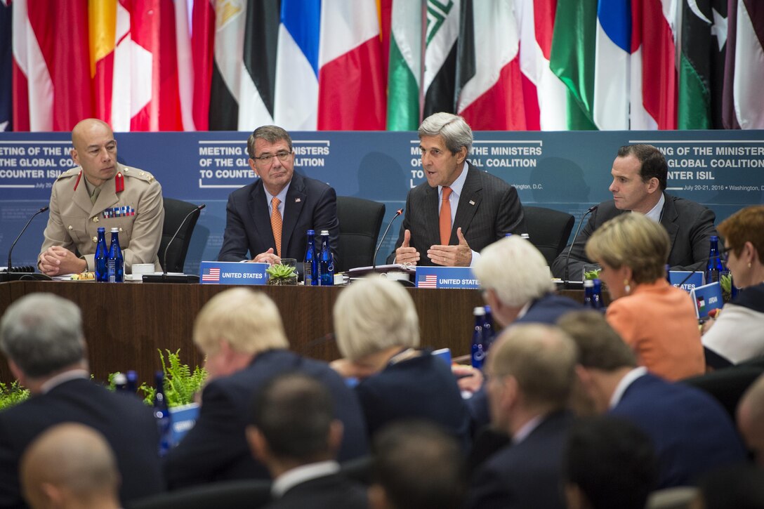 Secretary of State John F. Kerry, second from right, makes remarks  as Defense Secretary Ash Carter, second from left, listens during a meeting of the coalition to counter the Islamic State of Iraq and the Levant in Washington, D.C., July 21, 2016. DoD photo by Air Force Tech. Sgt. Brigitte N. Brantley