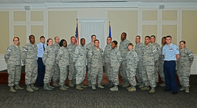 Team Shaw technical sergeant selects pose for a photo at the Carolina Skies Club and Conference Center at Shaw Air Force Base, S.C., July 21, 2016. This year, the Air Force promoted 7,501 of 33,569 eligible staff sergeants to the rank of technical sergeant, 74 of whom are from Team Shaw. (U.S. Air Force photo by Airman 1st Class Destinee Dougherty)