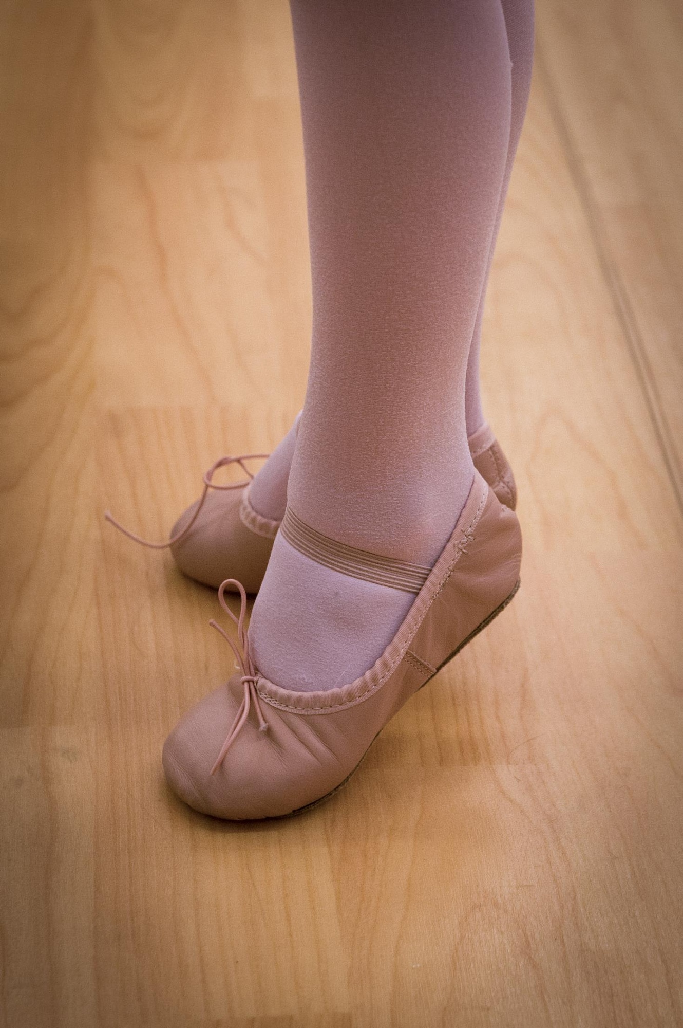 A dancer performs a relevé during a youth dance camp, July 20, 2016, at Moody Air Force Base, Ga. The relevé is a basic step that teaches dancers how to balance on their toes, gradually evolving into a more advanced move, such as a pointé. (U.S. Air Force photo by Airman 1st Class Lauren M. Hunter)