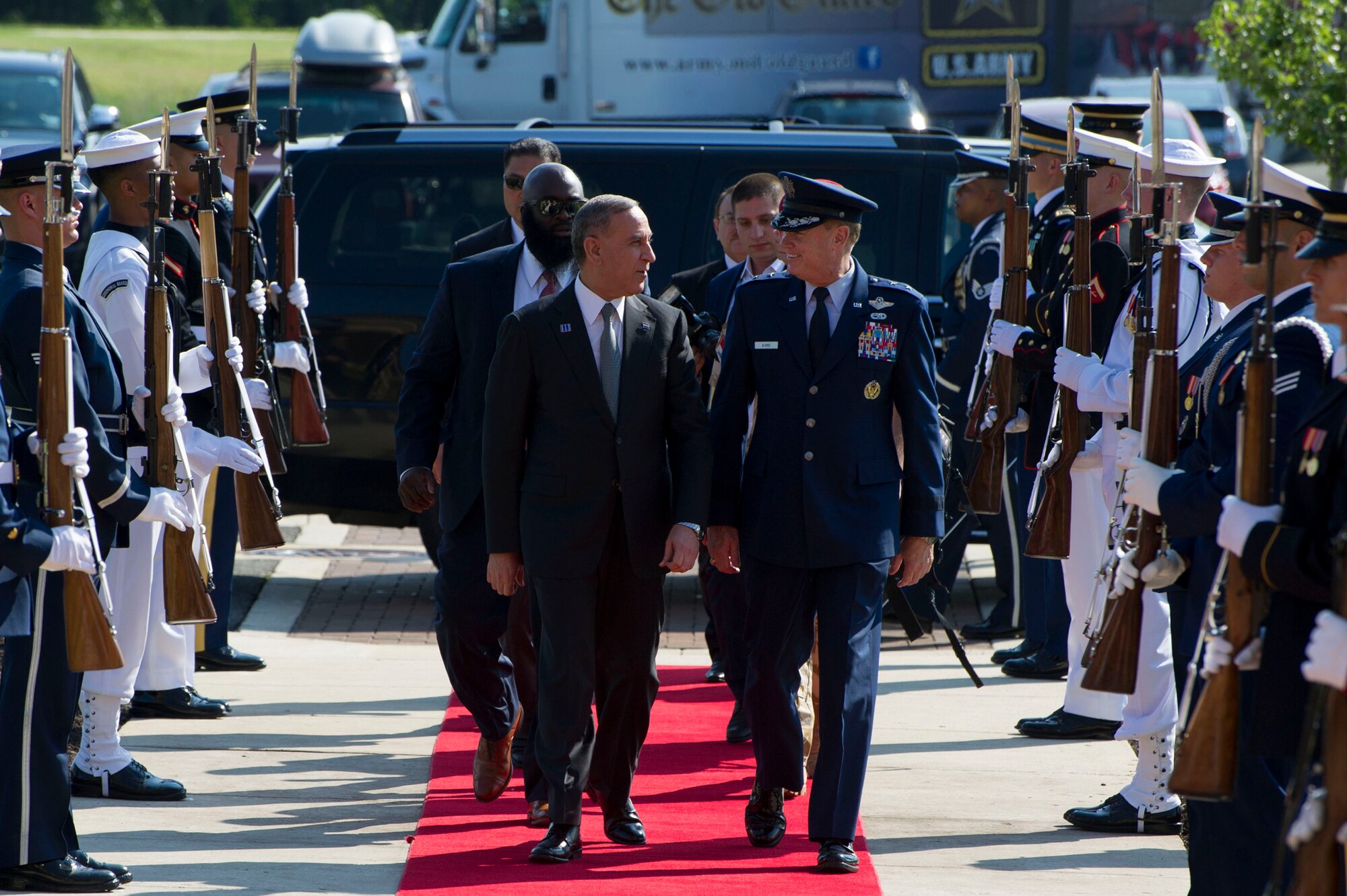 Air Force District of Washington Commander Maj. Gen. Darryl Burke greets and walks with Iraq's Defense Minister Khalid Yassin al-Obeidi as he arrives at the Gen. Jacob E. Smart Conference Center on Joint Base Andrews, Md., to attend the Counter ISIL Defense Ministerial to discuss the ongoing military campaign against ISIL with ministers of defense and other senior leaders from nations of the counter-ISIL coalition July 20 2016. (Photo by U.S. Air Force Senior Master Sgt. Adrian Cadiz)(Released)