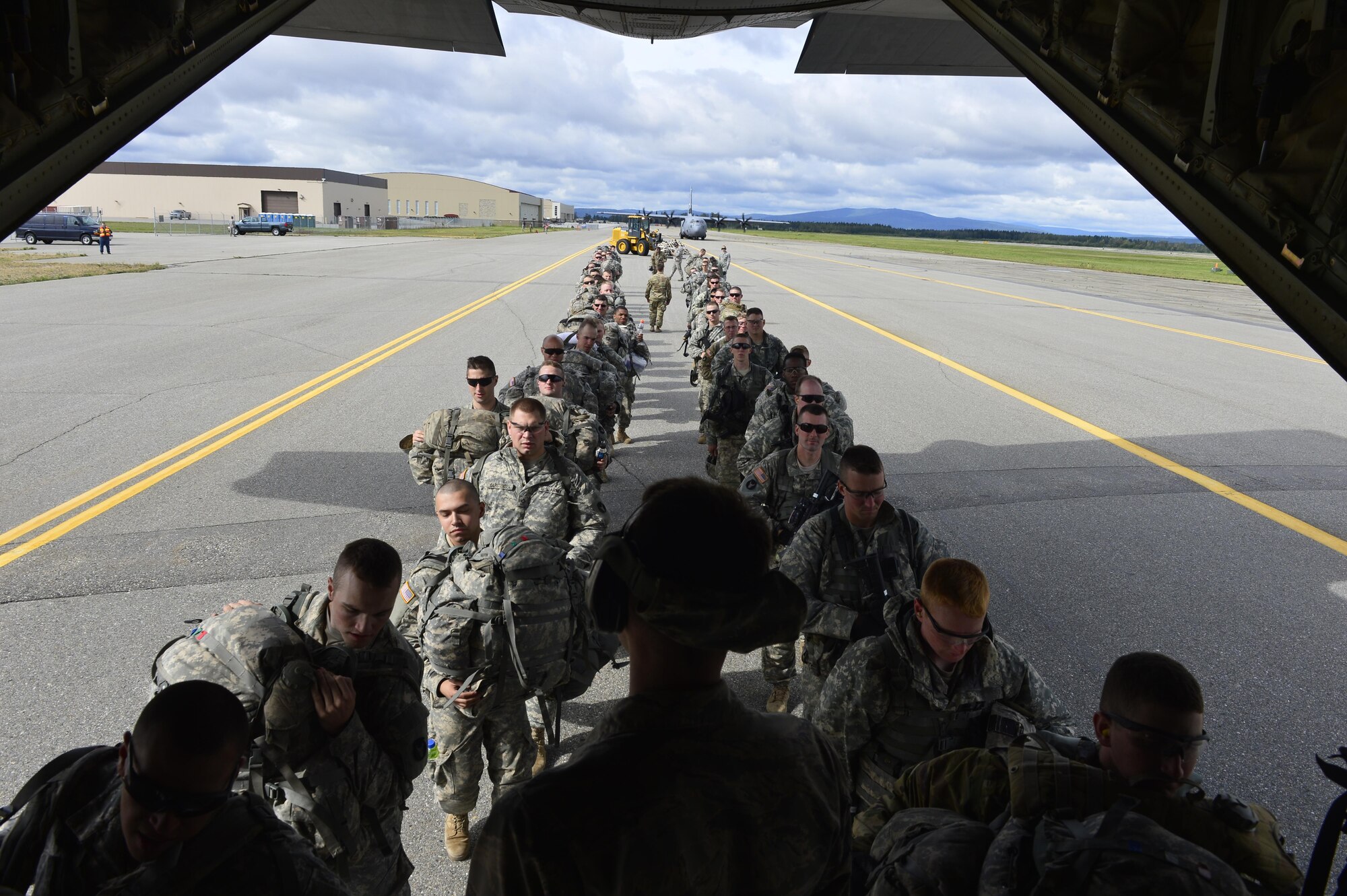 U.S Army Soldiers board a C-130J from the 41st Airlift Squadron and are later inserted into a simulated forward operating base in Alaska to provide realistic conditions in deployed locations on July 20, 2016. Arctic Anvil is an integrated combined, joint and coalition training event integrating the U.S Air Force, U.S. Army Alaska, Alaska National Guard, Iowa National Guard, 196th Infantry Brigade and the Canadian military. (U.S. Air Force photo by Senior Airman Kaylee Clark)