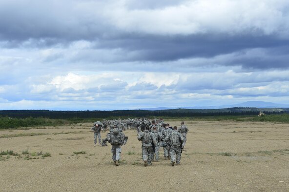 U.S Army Soldiers depart from a C-130J assigned to the 41st Airlift Squadron into a simulated forward operating base in Alaska July 20, 2016. The U.S. Army soldiers participated in Exercise Arctic Anvil, a joint coalition training event integrating the U.S Air Force, Alaska National Guard, Iowa National Guard, 196th Infantry Brigade and the Canadian military. (U.S. Air Force photo by Senior Airman Kaylee Clark)