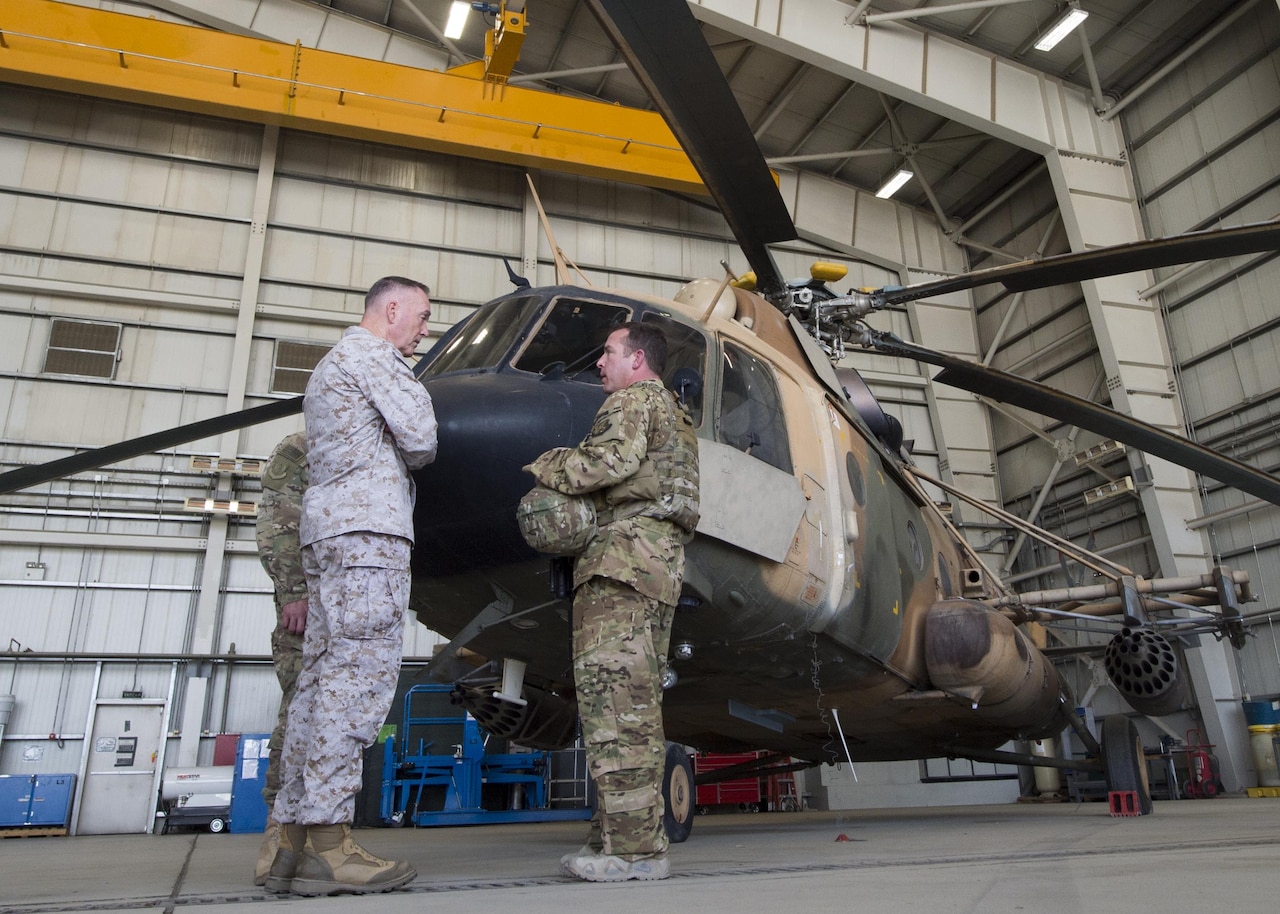 Marine Corps Gen. Joe Dunford, chairman of the Joint Chiefs of Staff, meets with members of the Train, Advise, Assist Command-Air in Kabul, Afghanistan, July 16, 2016. Dunford met with key leaders and received briefings about the progress of the Afghan air force and its partnership with TAAC-Air as part of his overall assessment of the Resolute Support mission. DoD photo by Navy Petty Officer 2nd Class Dominique A. Pineiro