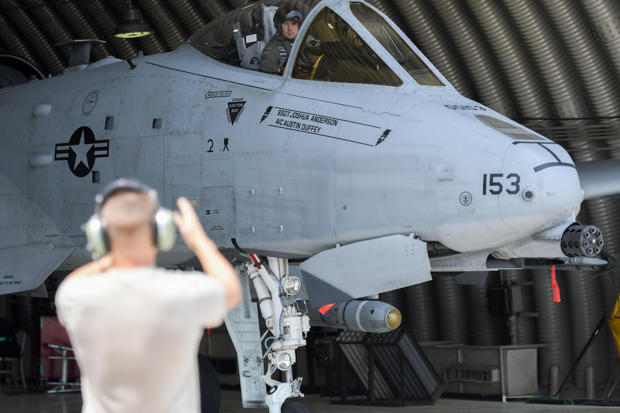 Airman Weston Meyer, 25th Aircraft Maintenance Unit crew chief, marshals an A-10 Thunderbolt II from the 25th Fighter Squadron before a combat search and rescue exercise flight at Osan Air Base, Republic of Korea, July 19, 2016. The CSAR flight is part of Exercise Pacific Thunder 16-2, a combined training event designed to enhance the readiness of U.S. and ROK forces to defend the Korean peninsula by sustaining their capabilities.(U.S. Air Force photo by Staff Sgt. Jonathan Steffen/Released)