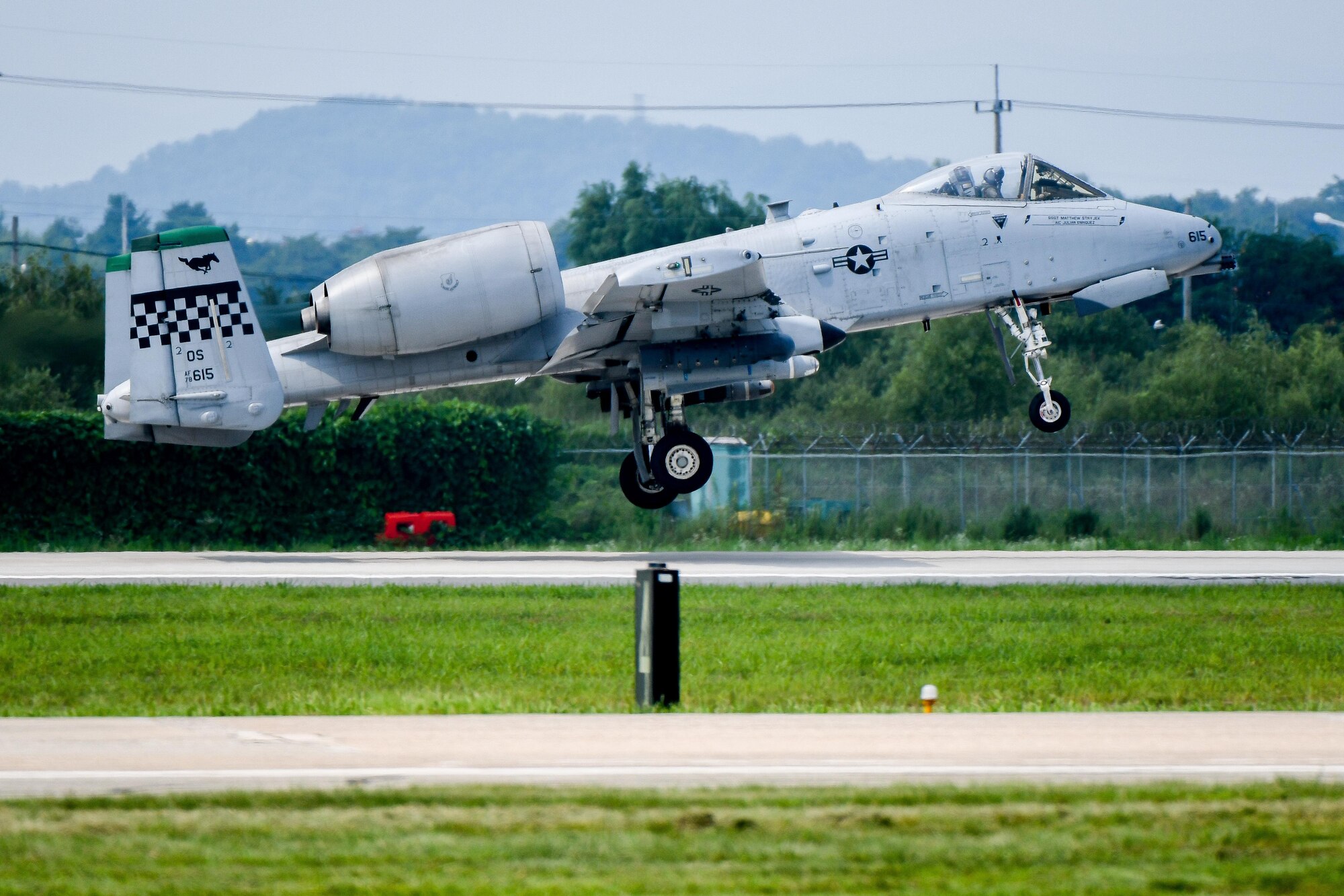 An A-10 Thunderbolt II assigned to the 25th Fighter Squadron lifts off from Osan Air Base, Republic of Korea, July 19, 2016. The A-10 was en-route to a combat search and rescue scenario during Exercise Pacific Thunder 16-2, a combined exercise to enhance interoperability between U.S. and ROK forces. (U.S. Air Force photo by Staff Sgt. Jonathan Steffen/Released)