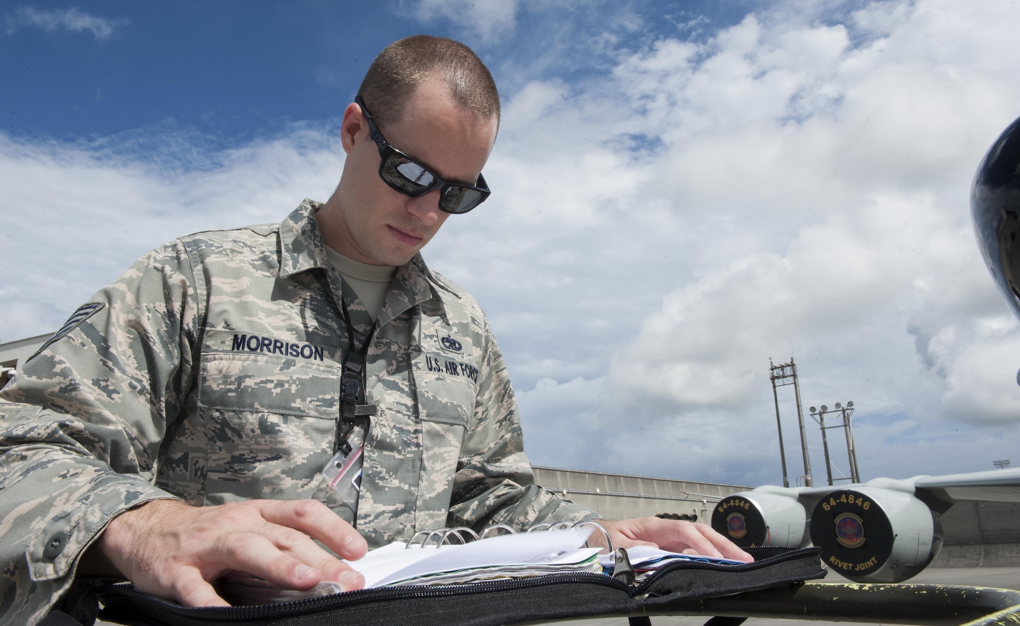 U.S. Air Force Tech. Sgt. Matthew Morrison, 82nd Reconnaissance Squadron quality assurance chief inspector, examines a safety checklist July 18, 2016, at Kadena Air Base, Japan. The 82nd RS QA office checks the maintenance performed on Kadena’s reconnaissance aircraft. One mistake could lead to the loss or delay of critical Higher Headquarters missions. (U.S. Air Force photo by Airman 1st Class Lynette M. Rolen)