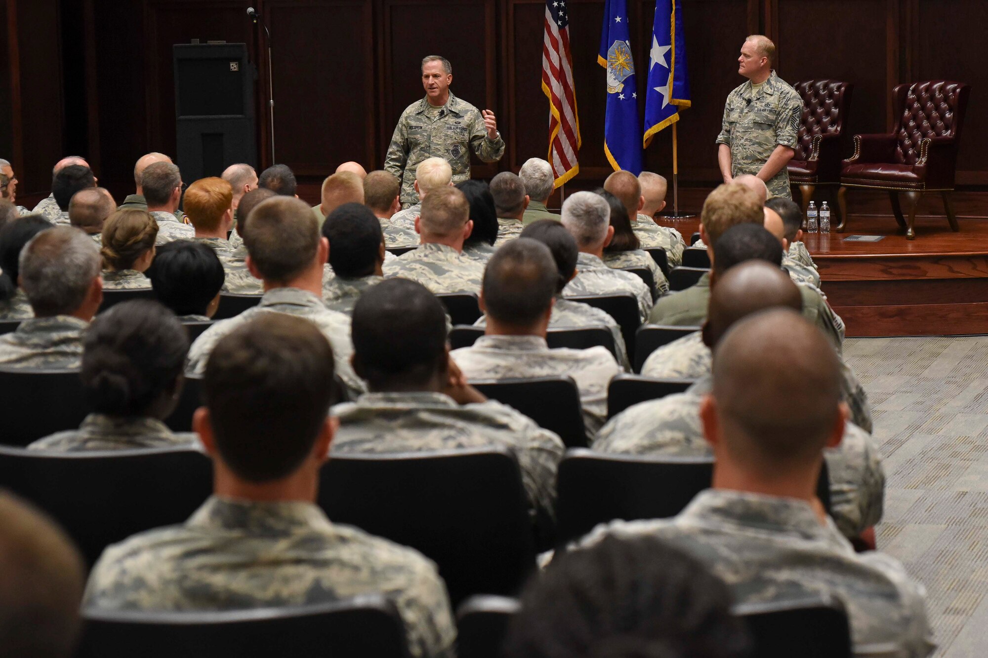Gen. David L. Goldfein, Chief of Staff of the Air Force, and Chief Master Sgt. James A. Cody, Chief Master Sgt. of the Air Force, address Airmen of the 187th Fighter Wing during an all-call July 19, 2016 at the Montgomery Regional Air National Guard Base. The visit was a chance for Goldfein and Cody to see the wing's mission, meet Airmen, and thank them for their service. (U.S. Air National Guard photo by Airman First Class Hayden Johnson)
