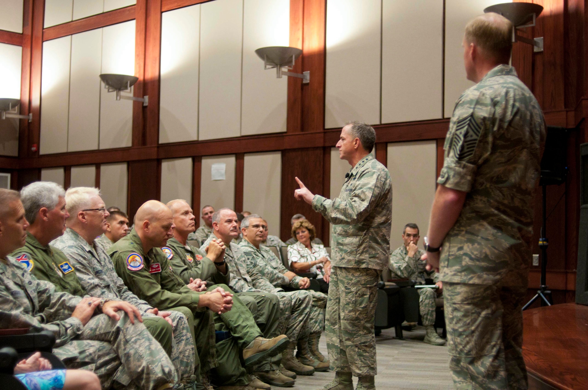 Gen. David L. Goldfein, Chief of Staff of the Air Force, and Chief Master Sgt. James A. Cody, Chief Master Sgt. of the Air Force, address Airmen of the 187th Fighter Wing during an all-call July 19, 2016 at the Montgomery Regional Air National Guard Base. The visit was a chance for Goldfein and Cody to see the wing's mission, meet Airmen, and thank them for their service. (U.S. Air National Guard photo by Staff Sgt. Jared Rand)