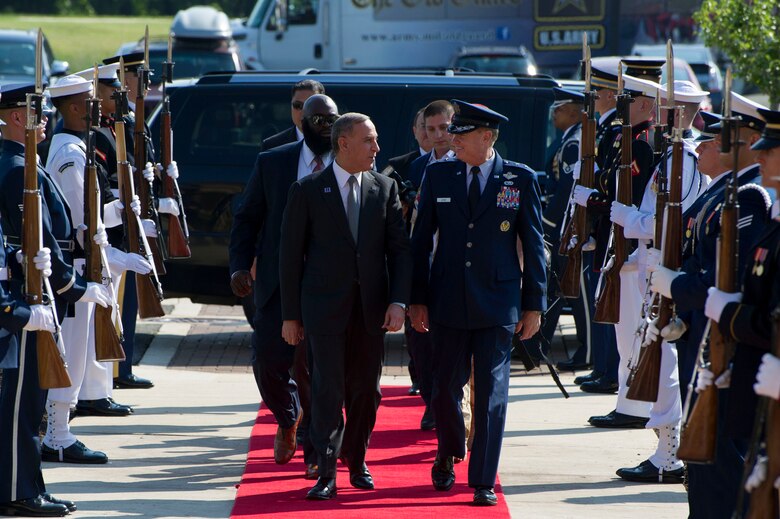 Air Force District of Washington Commander Maj. Gen. Darryl Burke greets and walks with Iraq's Defense Minister Khalid Yassin al-Obeidi as he arrives at the Gen. Jacob E. Smart Conference Center on Joint Base Andrews, Md., to attend the Counter ISIL Defense Ministerial to discuss the ongoing military campaign against ISIL with ministers of defense and other senior leaders from nations of the counter-ISIL coalition July 20 2016. (Photo by U.S. Air Force Senior Master Sgt. Adrian Cadiz)(Released)