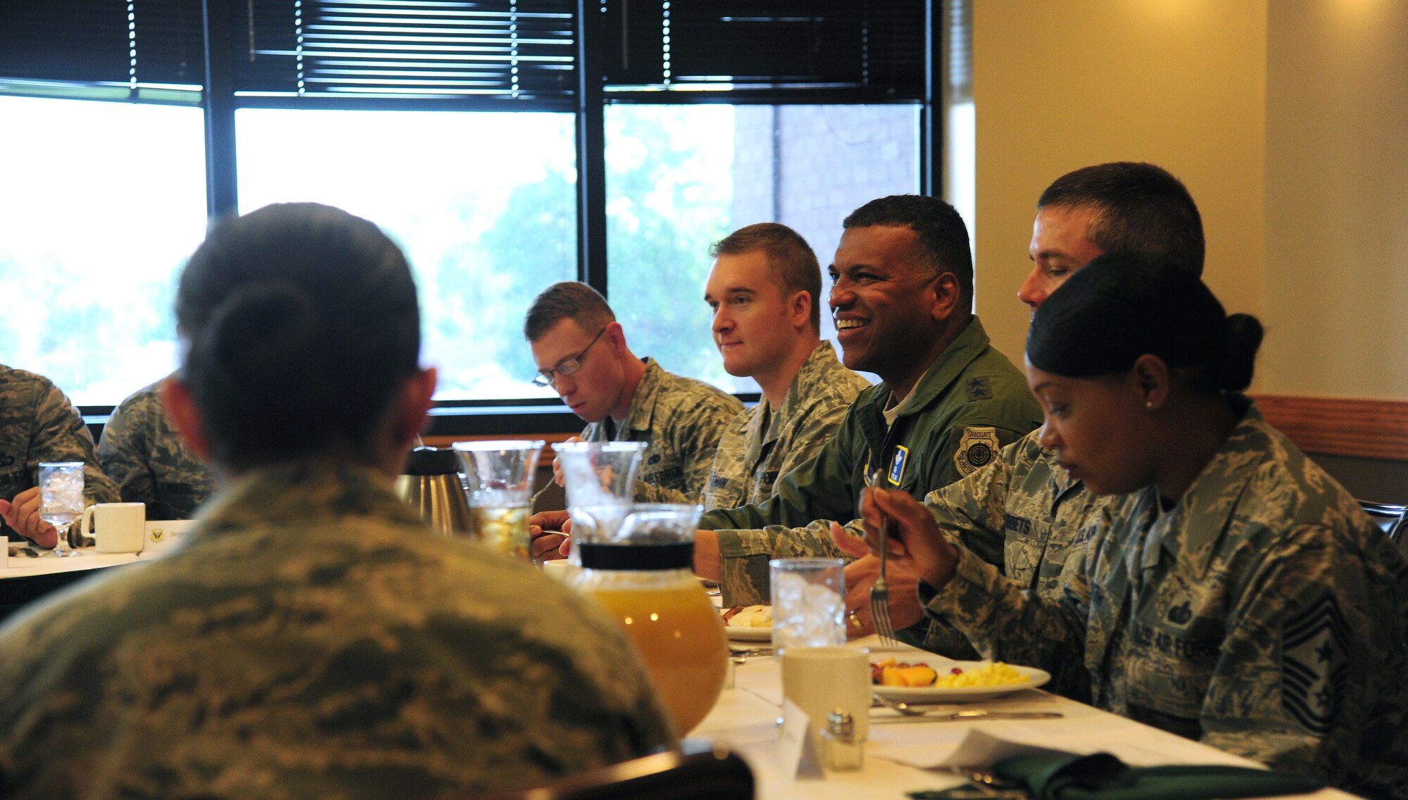 U.S. Air Force Maj. Gen. Richard M. Clark, the 8th Air Force commander, has lunch with NCOs at Whiteman Air Force Base, Mo., July 14, 2016. Clark met with Whiteman leadership and Airmen to gain insight into the mission of the 509th and 131st Bomb Wings. (U.S. Air Force photo by Senior Airman Joel Pfiester)