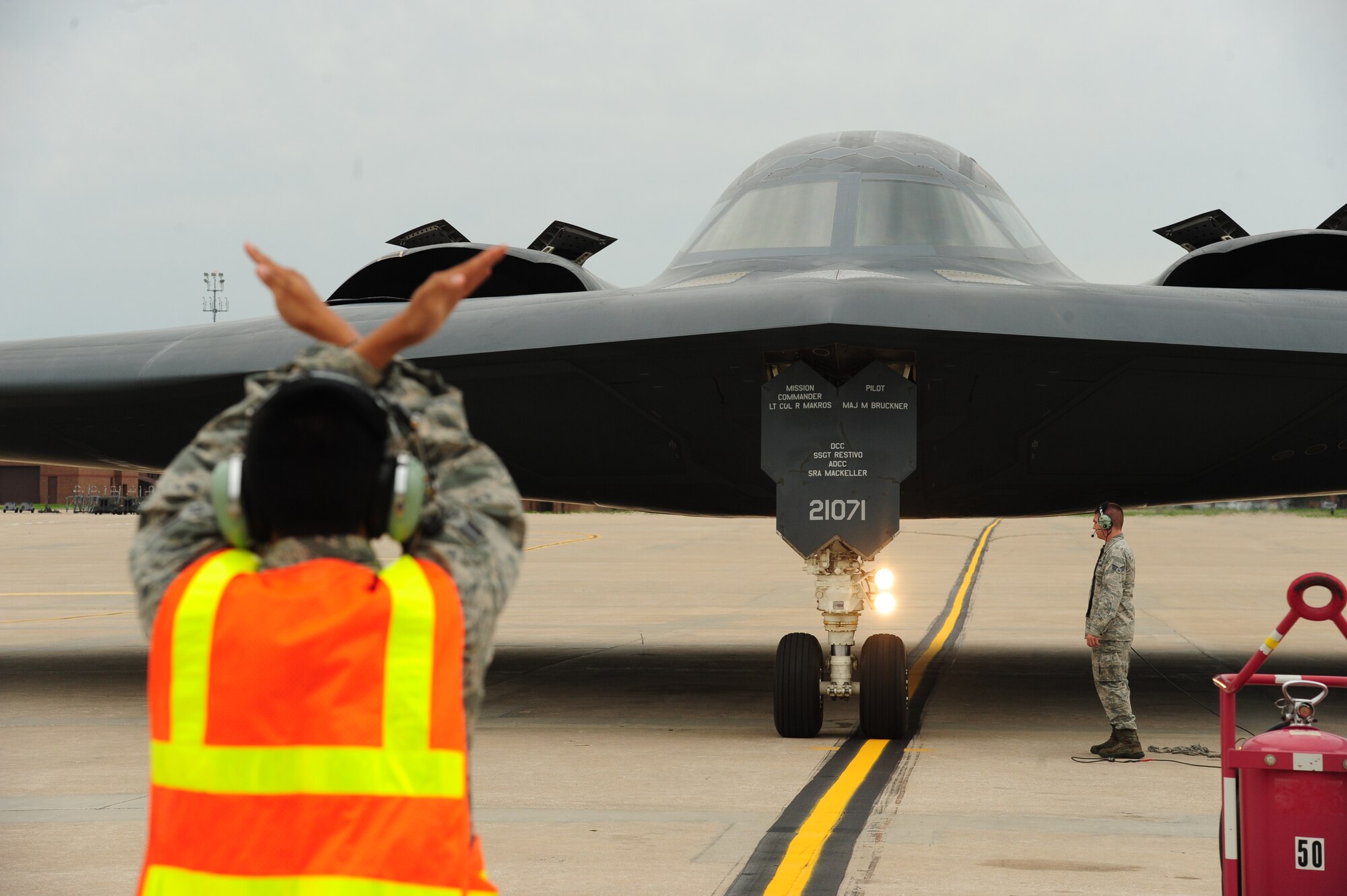 A 509th Aircraft Maintenance Squadron crew chief signals Maj. Gen. Richard Clark, 8th Air Force commander, as he taxis a B-2 Spirit at Whiteman AFB, Mo., June 14, 2016. The B-2 is one of three bomber platforms aligned within the Mighty Eighth. Other aircraft include the B-52 Stratofortress and the B-1 Lancer. (U.S. Air Force photo by Senior Airman Joel Pfiester)