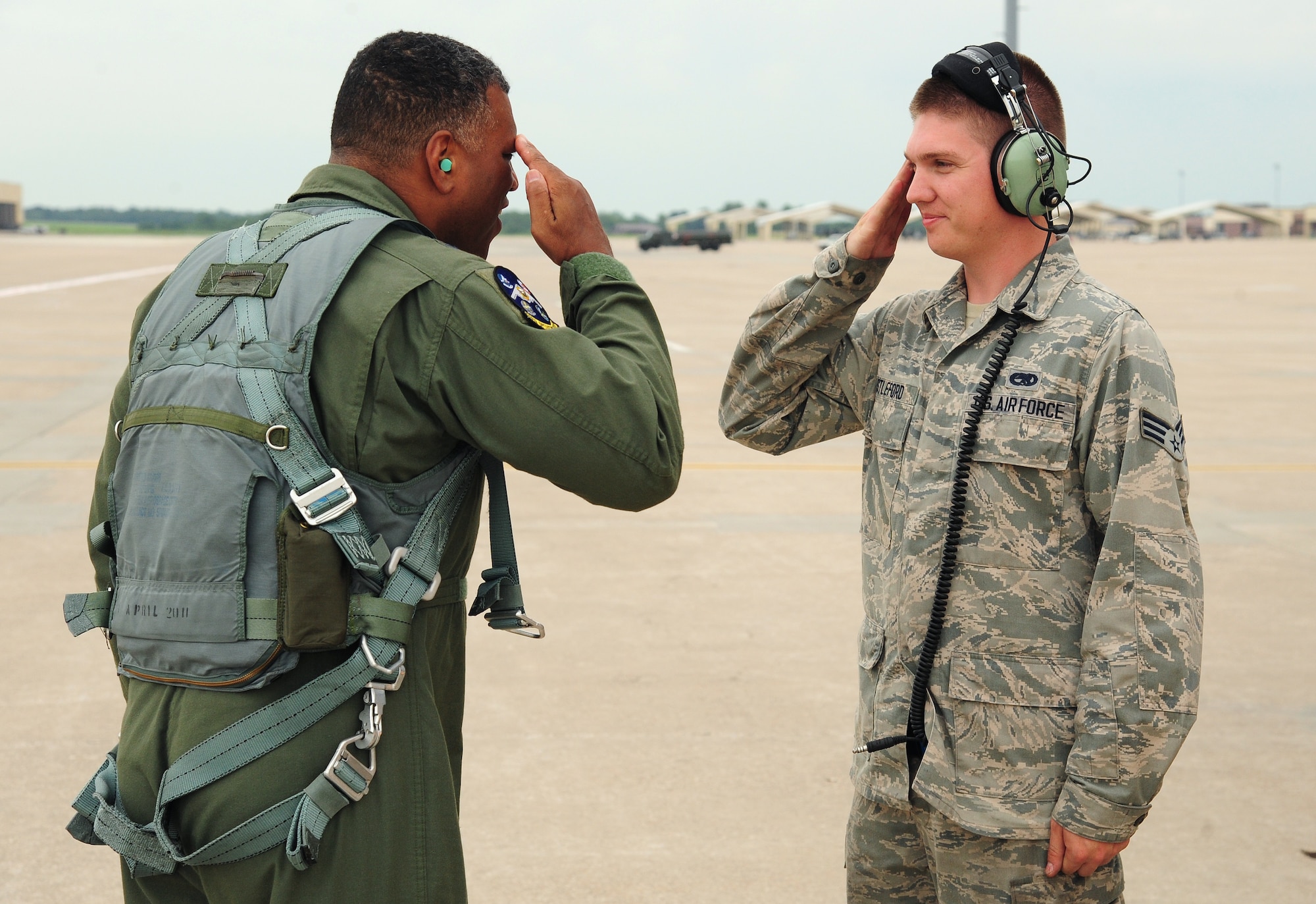 U.S. Air Force Maj. Gen. Richard M. Clark, the 8th Air Force commander, returns a salute to U.S. Air Force Senior Airman David Astleford, a 509th Aircraft Maintenance Squadron crew chief at Whiteman Air Force Base, Mo., July 14, 2016. Clark had the opportunity to meet with the crew chiefs before his first flight in a B-2 Spirit. (U.S. Air Force photo by Senior Airman Joel Pfiester)