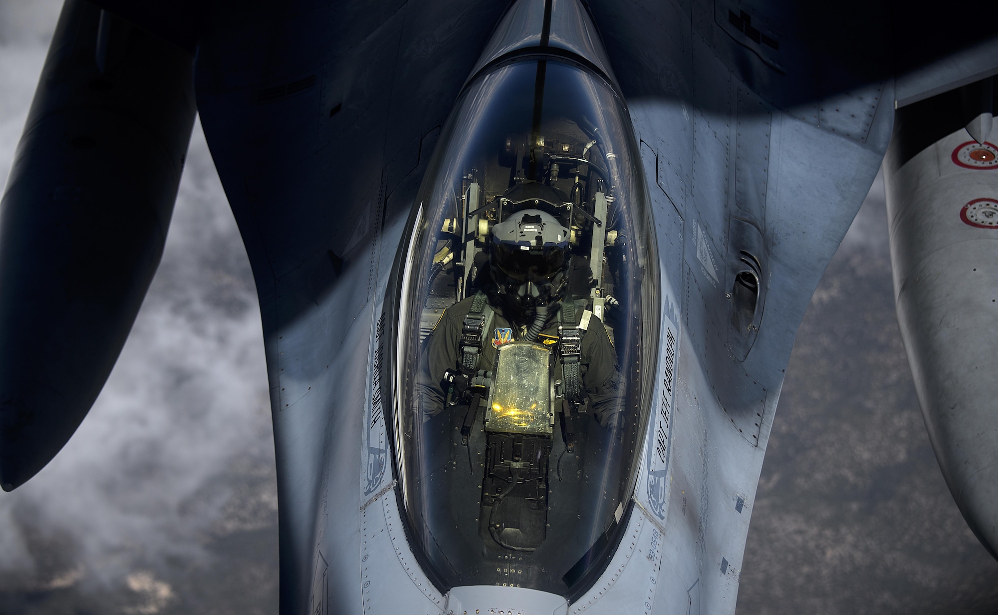 An F-16 Fighting Falcon from Joint Base Langley-Eustis, Va., receives fuel from a KC-135 Stratotanker July 18, 2016, while taking part in exercise Red Flag 16-3 at Nellis Air Force Base, Nev. Red Flag 16-3 is one of four Red Flag exercises at Nellis AFB, with this iteration focusing on multi-domain operations in air, space and cyberspace. (U.S. Air Force photo/Tech. Sgt. David Salanitri)