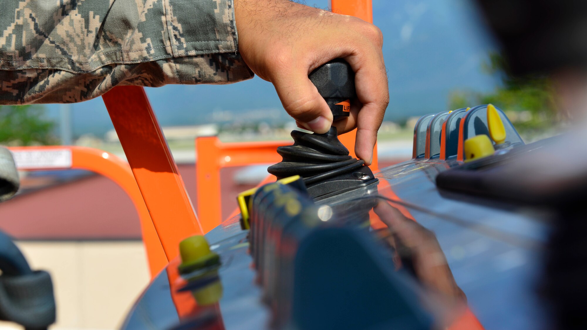Airman 1st Class John Chavez, 31st Civil Engineer Squadron electrical systems journeyman, controls a lift truck used to install a lightning protection system, July 20, 2016, at Aviano Air Base, Italy. Electrical systems Airmen repair and maintain the base’s electrical components. (U.S. Air Force photo by Airman 1st Class Cary Smith/Released)