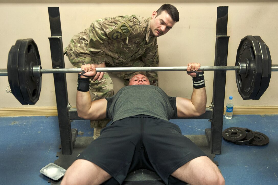 Peter Olsen, a Defense Department civilian, participates in a bench press event during a powerlifting competition at Bagram Airfield, Afghanistan, July 15, 2016. Olsen is assigned to the 455th Expeditionary Aircraft Maintenance Squadron. Air Force photo by Capt. Korey Fratini