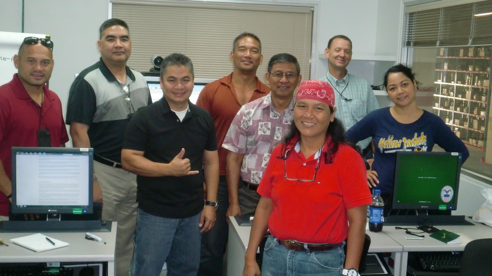DLA Distribution Guam employees pause for a team photo after completing skills training.
