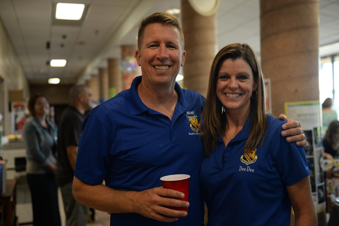 Brig. Gen. Patrick Doherty, 82nd Training Wing commander, and his wife, Dee Dee, spend time visiting and greeting new families to Sheppard Air Force Base, Texas, during the summer picnic, July 20, 2016. The picnic hosted several base helping agencies to welcome new families to the base and community. (U.S. Air Force photo by Senior Airman Kyle E. Gese/Released)