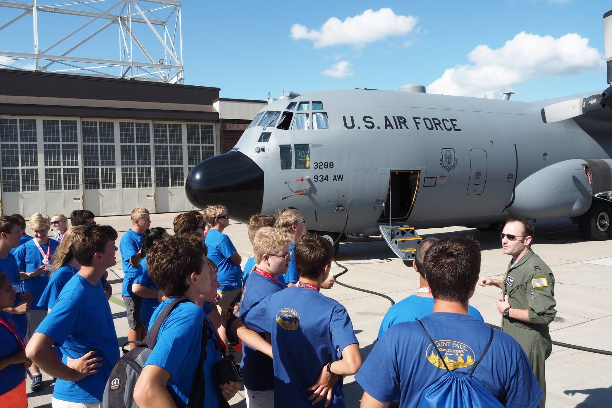 Capt. Andy Teigen, 96th Airlift Squadron pilot, talks with Aviation Career Education (ACE) camp students about the C-130 aircraft and mission of the 934th Airlift Wing.