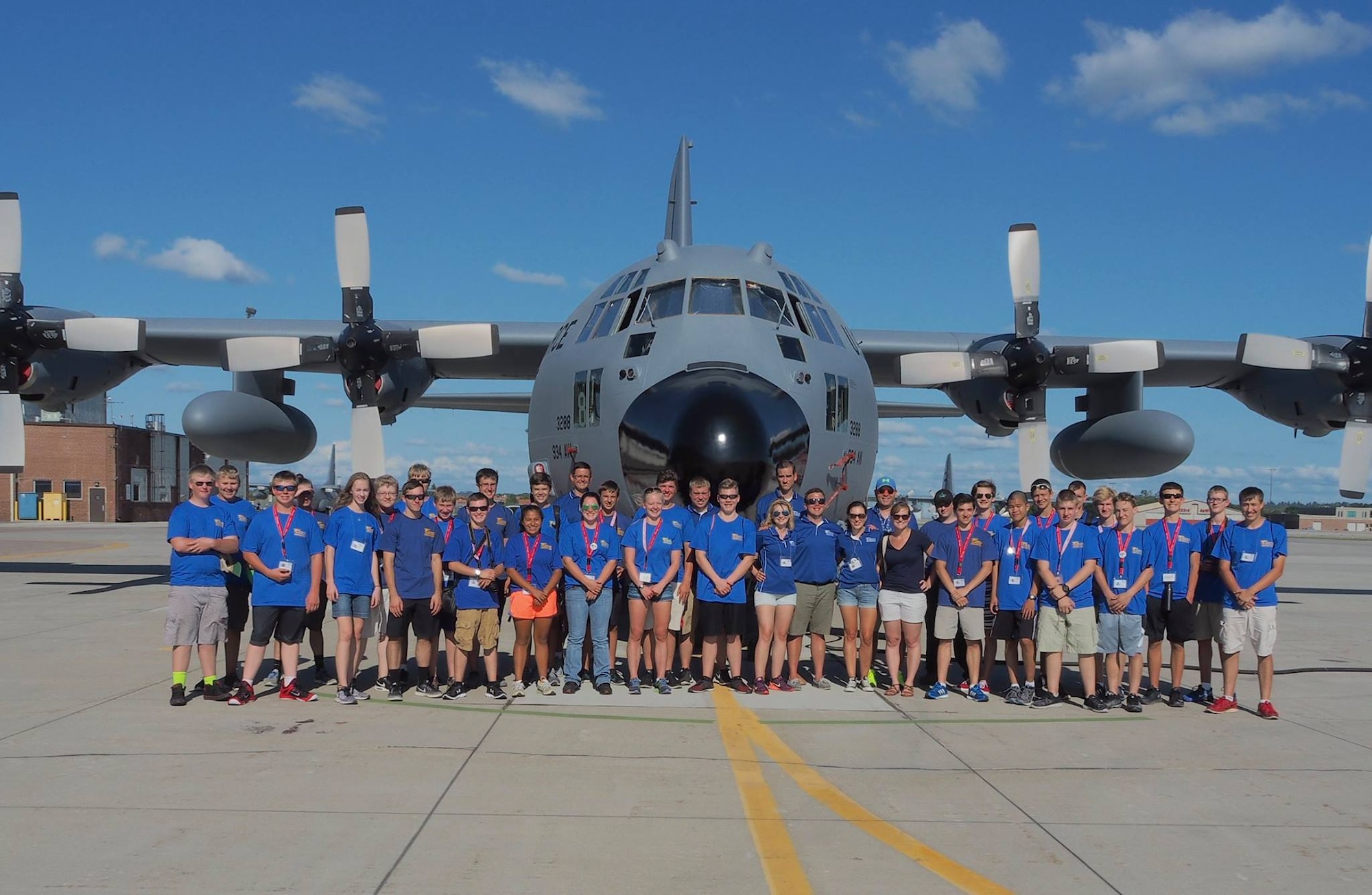 Aviation Career Education (ACE) Camp students pose in front of a 934th Airlift Wing C-130 after a tour of the aircraft July 19.